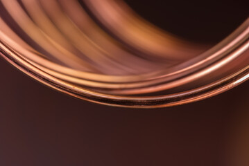 Copper wire closeup with blurred background, stock market raw materials industry