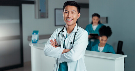 Happy, doctor arms crossed and Asian man, nurse or surgeon with career smile, job experience or...