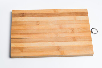 Old cutting board isolated on white studio background.