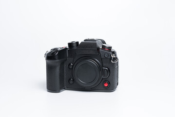 A photo camera on a white background.