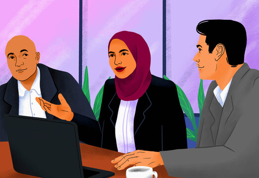 Businesswoman in hijab talking with colleagues in conference room meeting
