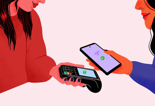 Woman with smart phone using contactless payment in shop
