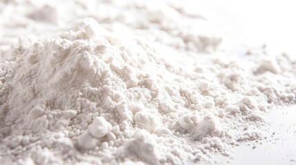 Flour placed on a white background. View from above 