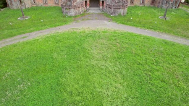 Aerial video of the abandoned Sammezzano castle in Leccio, Tuscany, Italy. The castle boasts Moorish architecture, and is located in a breathtaking landscape. Filmed during sunset.