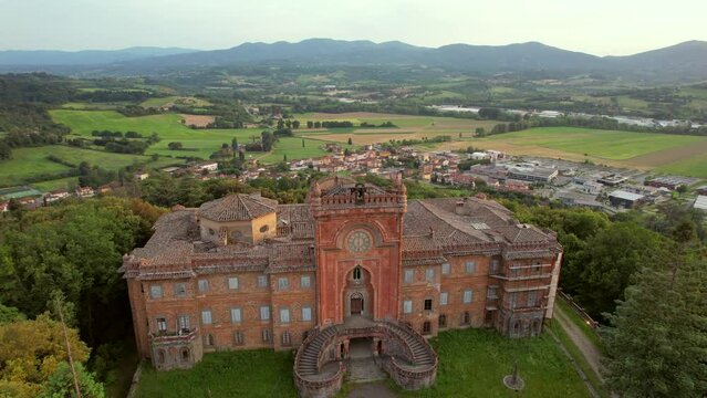 Aerial video of the abandoned Sammezzano castle in Leccio, Tuscany, Italy. The castle boasts Moorish architecture, and is located in a breathtaking landscape. Filmed during sunset.