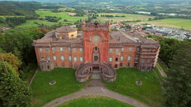 Aerial video of the abandoned Sammezzano castle in Leccio, Tuscany, Italy. The castle boasts Moorish architecture, and is located in a breathtaking landscape. Filmed during sunset.