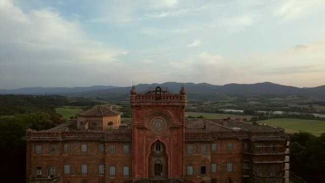 Aerial video of the abandoned Sammezzano castle in Leccio, Tuscany, Italy. The castle boasts Moorish architecture, and is located in a breathtaking landscape. Filmed during sunset.