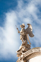 Statue of St Michael killing the Satan , on the top of St Jacobs cathedral in Sibenik, Croatia