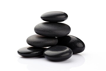 Fototapeta na wymiar Black spa stones isolated on white background