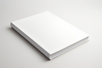 Blank white book on grey background - obrazy, fototapety, plakaty