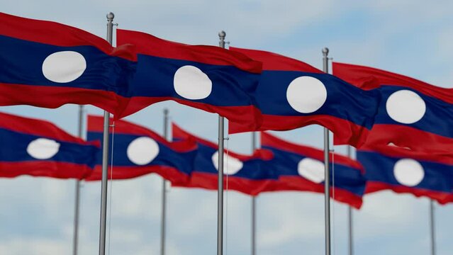 Laos many flags waving together in the wind, seamless looped video