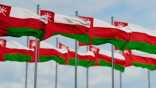 Oman many flags waving together in the wind, seamless looped video