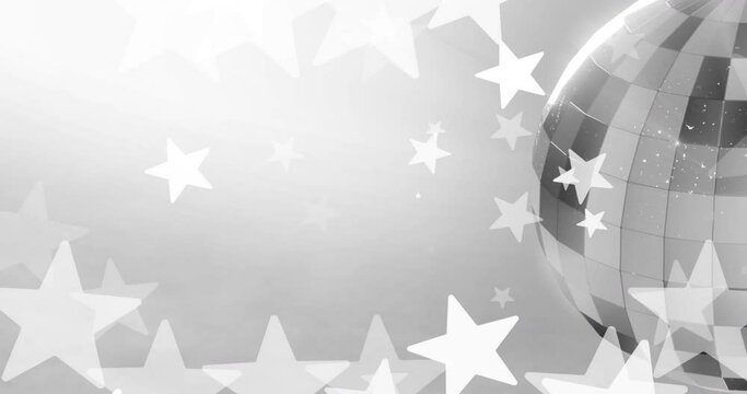 Animation of white star over silver disco ball on grey background