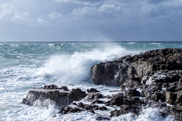 Waves of the raging sea.