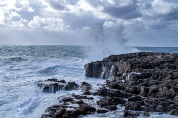 Waves of the raging sea.