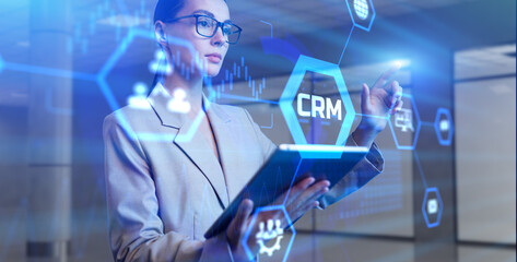 CRM Customer relationship management software system business technology concept. Young business woman pressing button on virtual screen.