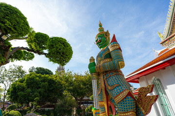 Gates to Ordination Hall with statues of Giants, demon guardians at Wat Arun