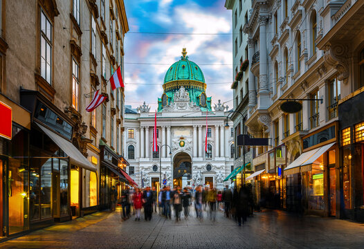 The pedestrian zone Herrengasse with a view towards imperial Hofburg palace in Vienna, Austria.  Kohlmarkt shopping street in Vienna.