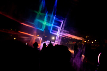 Fototapeta na wymiar Disco dancing club, light effects, light show