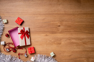 Beautiful New Year and Christmas gift boxes and decorations. The concept of the celebration party of winter holidays. Flat lay, top view, copy space.