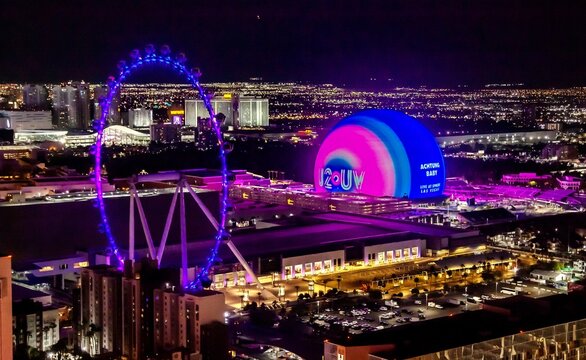 Las Vegas, Nevada, USA - November 7th, 2023: MSG Sphere and High Roller illuminated at night