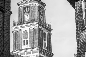 view of a church tower in black and white