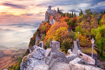 San Marino, Republic of San Marino, Italy. Aerial landscape image of San Marino, Italy at beautiful autumn sunrise. - obrazy, fototapety, plakaty