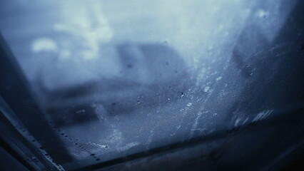 Winter Window Condensation on Moody Day, Depression Concept. Melancholic theme of person POV stuck...