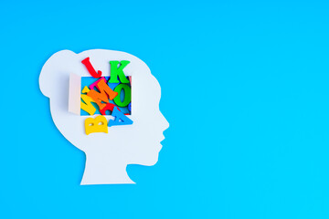 Human Head Silhouette with Open Window to Vibrant Letters