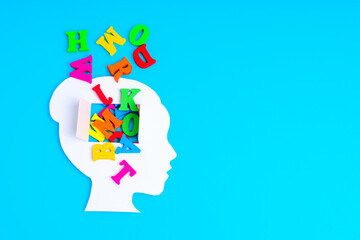 Woman Head Paper Shape with Open Mind and Vibrant Letters