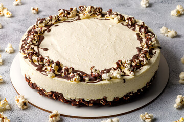 Cottage cheese cake with popcorn. Light background