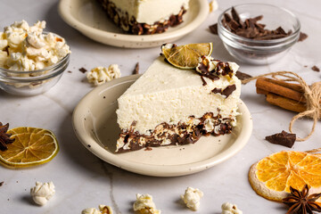 Cottage cheese cake with popcorn. Light background