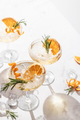 Sidecar cocktail with a sugar rim on white marble table. Festive party composition
