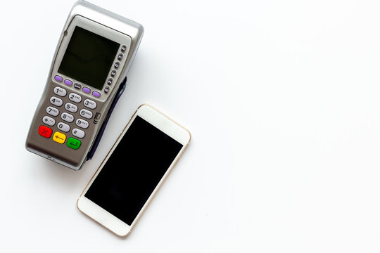 POS payment terminal reader with mobile phone. Online banking concept