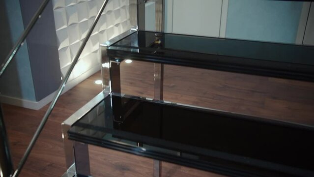 modern metal and glass staircase with handrail, chrome style stairs with railing