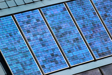Solar panels on a roof, abstract renewable energy background - obrazy, fototapety, plakaty