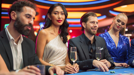  Portrait of a Glamorous Asian Woman Sitting at a Blackjack Table with Friends in a Modern Casino....