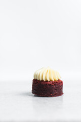 Fudgy red velvet brownie with cream cheese frosting, red velvet fudge brownies on a white background