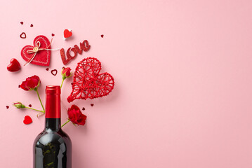 Passionate ambiance! Top view of a wine bottle surrounded by heart confetti, roses, and themed decor on a pastel pink surface. Leave space for your text or advertisement - obrazy, fototapety, plakaty