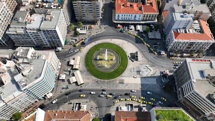 Aerial photo of recently renovated fountain of famous round square of Omonia in the heart of Athens...