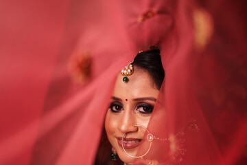Creative portrait of beautiful indian bride