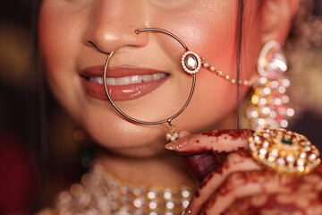 Closeup of nath jewellery worn by indian bride