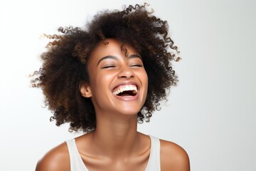 professional portrait studio photo of a handsome young afro american tatooed woman model with perfect clean teeth laughing and smiling. isolated on white background. for ads and web design  - obrazy, fototapety, plakaty