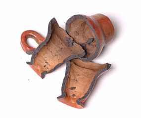 Old brown pottery, isolated on white