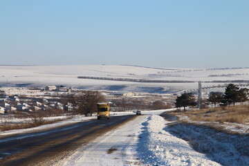 A train on a snowy road