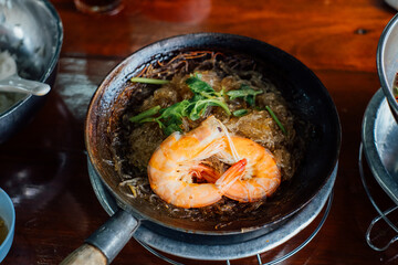 Shrimp with glass noodles is a popular Thai dish that is made with shrimp, glass noodles, and a flavorful sauce. 