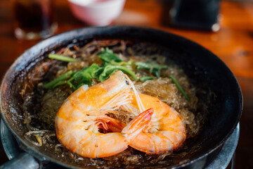 Shrimp with glass noodles is a popular Thai dish that is made with shrimp, glass noodles, and a flavorful sauce. 