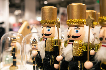 Wooden toy soldiers Nutcrackers on the shop window.