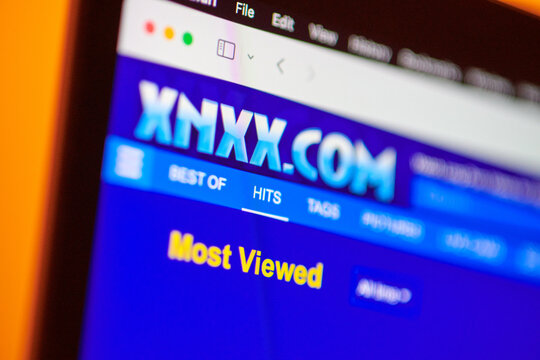 Homepage of XNXX website on laptop display, url - xnxx.com, popular free porn website