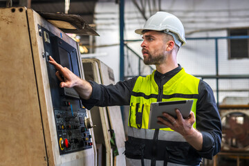 engineer look projects and planning with tablet mobile in factory